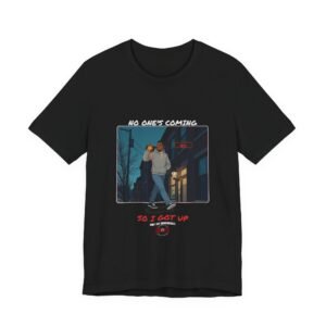 DFIYE 'No One's Coming' tee. A framed comic-panel night street scene: the character Deuce walks his block holding up a glowing gold-and-red DFIYE key, a lit DFIYE storefront sign behind him. Graffiti text reads 'No one's coming' and 'So I got up,' with the DFIYE chained-eye logo and 'Don't get comfortable.'